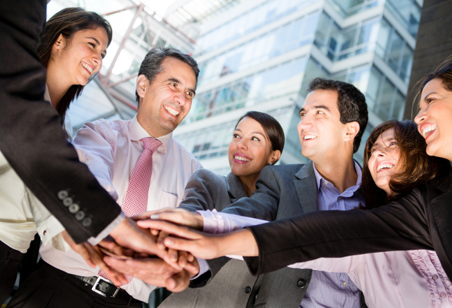 Business teamwork with a group of people with hands together